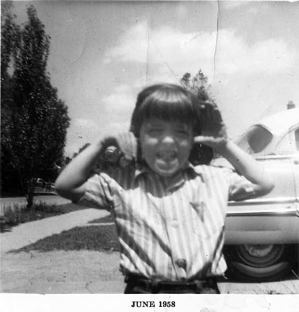 Mary-thumbs-ears,-1958